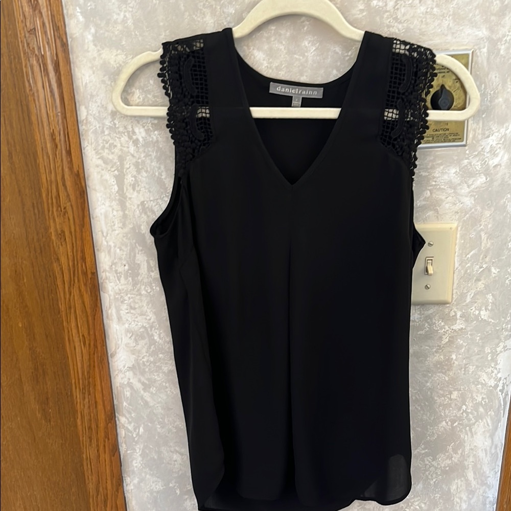 Black Sleeveless shell top with crochet detail straps